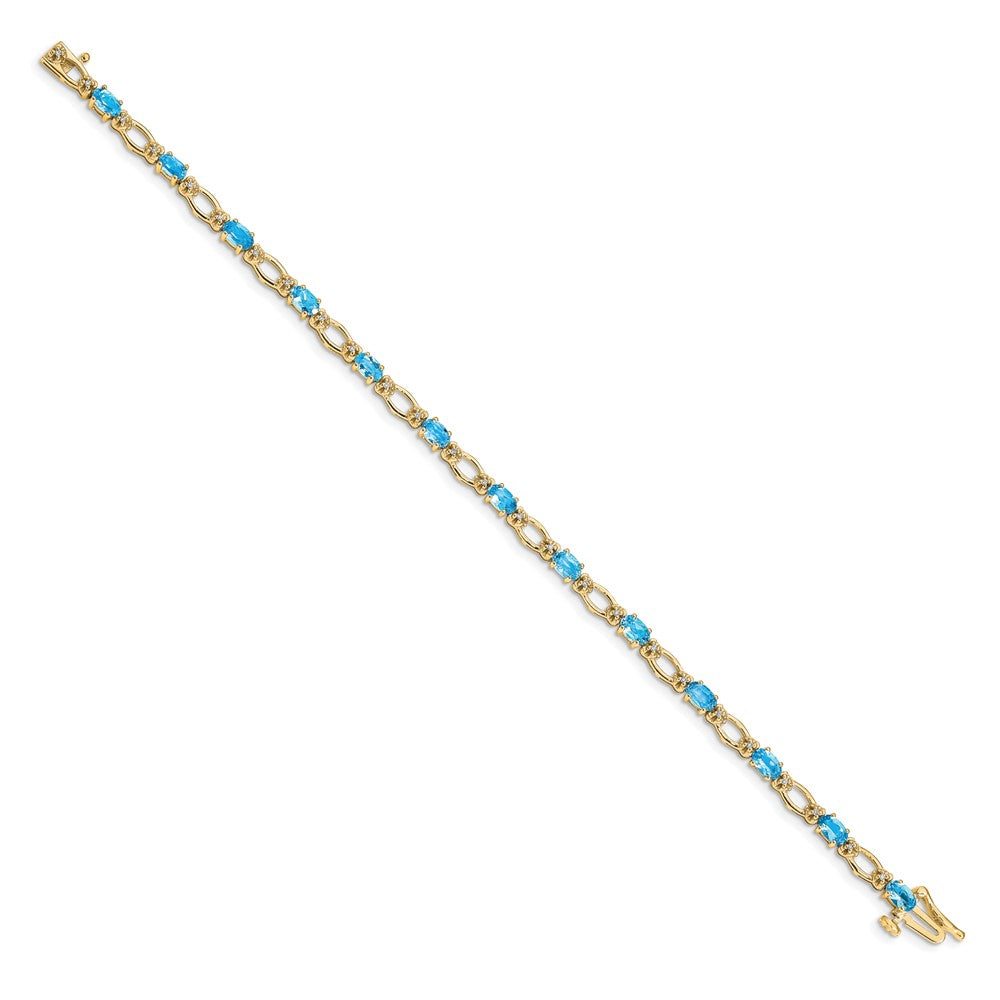 14k Complete Diamond and Oval Swiss Blue Topaz Heart Accent 7 inch Bracelet (6.27 grams)