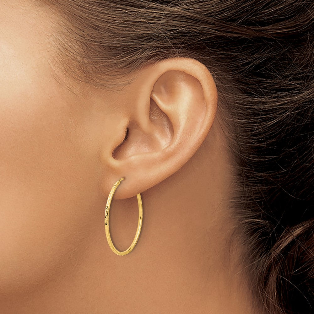 14k Yellow Gold 1.5 mm Endless Hoop Earrings (1.18 grams)