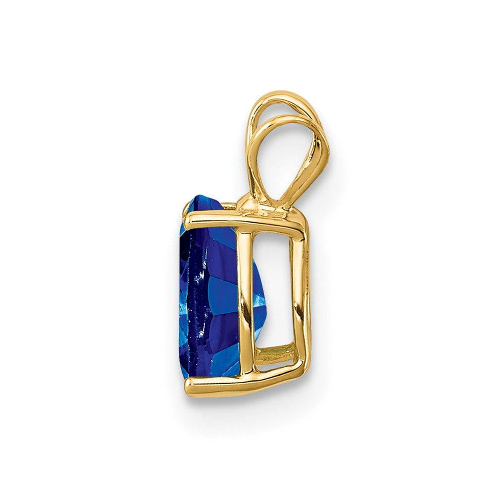 14k Sapphire pendant (0.34 grams)