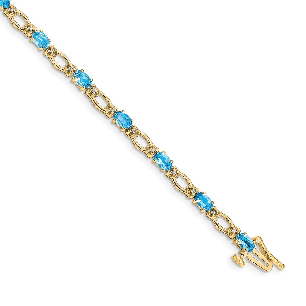 14k Complete Diamond and Oval Swiss Blue Topaz Heart Accent 7 inch Bracelet (6.27 grams)