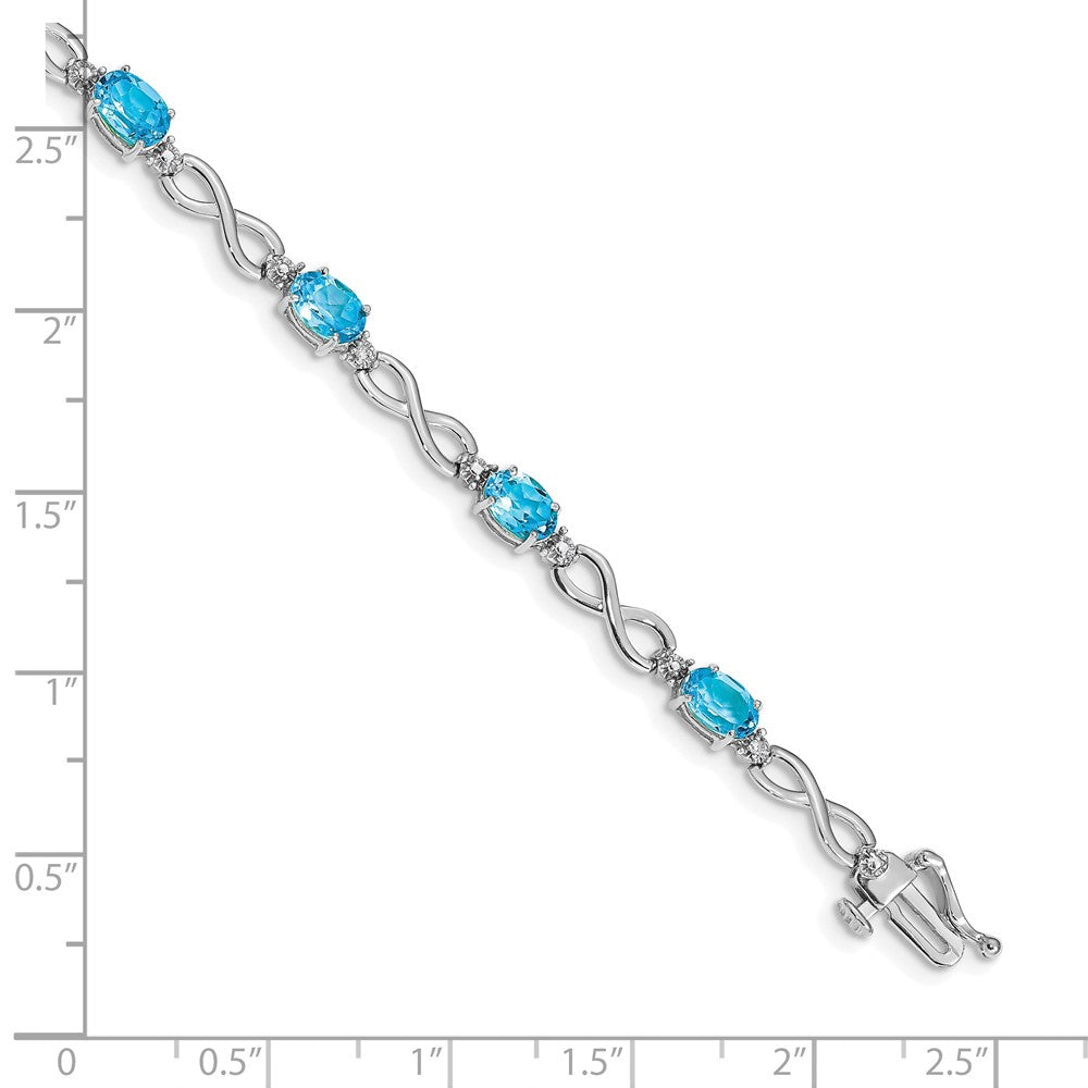 14k White Gold Complete Oval Swiss Blue Topaz and Diamond Infinity Link 7 inch Bracelet (4.65 grams)