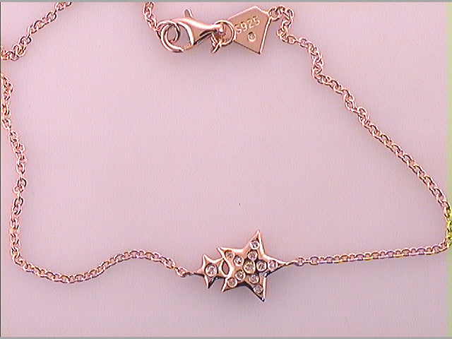 Sterling Silver 1/20Ctw-Dia Cn Double Star Bracelet (1.6 grams)