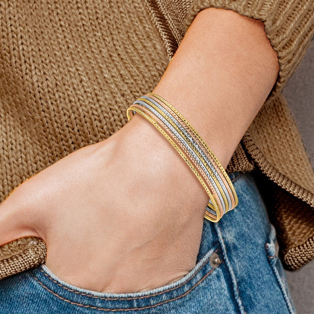 14K Oversize Tri-color Polished and Textured with Dangle Heart 7-Strand 11.00mm Slip-on Round Bangle Bracelet (11.1 grams)